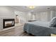 Spacious main bedroom with fireplace and view to sitting room at 3093 Brookshire Way, Duluth, GA 30096