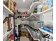 A walk-in pantry boasts ample shelving for organized storage at 3093 Brookshire Way, Duluth, GA 30096