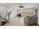Sitting room with an elliptical, desk, and view of the lake at 3093 Brookshire Way, Duluth, GA 30096