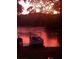 Atmospheric lake view at dawn with a private dock and serene waterfront ambiance at 3093 Brookshire Way, Duluth, GA 30096