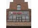Exterior view of The Club @Tin Cup Grill shows brickwork and large windows at 542 Sawnee Village Blvd # D69, Cumming, GA 30040