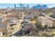 An aerial view of a neighborhood featuring houses and the city skyline in the background at 660 Delbridge Nw St, Atlanta, GA 30314