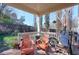This cozy back porch has plenty of seating with an open-air roof to provide plenty of sunlight at 660 Delbridge Nw St, Atlanta, GA 30314
