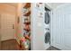 Hallway and pantry with access to the laundry machines at 660 Delbridge Nw St, Atlanta, GA 30314