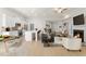 Bright and open living room and kitchen combo featuring hardwood floors, modern furniture and stainless steel appliances at 47 Colonial Ter, Villa Rica, GA 30180