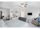 Spacious bedroom featuring a king size bed, neutral colors, and plenty of natural light at 7652 Baron Rd, Fairburn, GA 30213