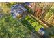 Aerial view of home with fenced backyard featuring gazebo, firepits and stone paths at 842 Laurelmont Sw Dr, Atlanta, GA 30311