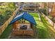 Custom-built gazebo with grill station overlooking the landscaped backyard at 842 Laurelmont Sw Dr, Atlanta, GA 30311