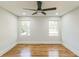 Bedroom with hardwood floors, recessed lighting and two windows offering natural light at 842 Laurelmont Sw Dr, Atlanta, GA 30311