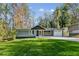 This single-Gathering home features a well-manicured lawn, an attached garage, and a modern brick exterior at 842 Laurelmont Sw Dr, Atlanta, GA 30311