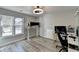 Modern office space with great natural light and hardwood floors at 10683 Glenleigh Dr, Johns Creek, GA 30097