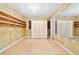Spacious walk-in closet with custom built-in shelves and wooden floors at 160 Deer Cliff Cv, Lawrenceville, GA 30043