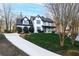 Beautiful two-story home with a well-manicured lawn and a long driveway at 160 Deer Cliff Cv, Lawrenceville, GA 30043