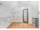 Spacious walk-in closet with multiple shelving units, hanging racks, and a decorative mirror at 160 Deer Cliff Cv, Lawrenceville, GA 30043
