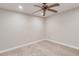 Bedroom boasting a ceiling fan, neutral paint and carpet at 2845 White Blossom Ln, Suwanee, GA 30024