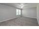 Bedroom featuring carpet, neutral paint, ceiling fan and natural light at 2845 White Blossom Ln, Suwanee, GA 30024