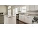 Charming kitchen with island, granite countertops, and stainless steel appliances at 2845 White Blossom Ln, Suwanee, GA 30024