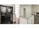 Charming kitchen with island, granite countertops, and stainless steel appliances at 2845 White Blossom Ln, Suwanee, GA 30024