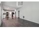 Open floor plan with hardwood floors, and a view to the kitchen at 2845 White Blossom Ln, Suwanee, GA 30024
