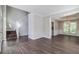 Bright and airy living room with hardwood floors, staircase, and open layout at 2845 White Blossom Ln, Suwanee, GA 30024