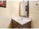 Bathroom vanity offers sleek design with a dark wood cabinet and a white countertop basin at 3259 Sentinel Cir, Lawrenceville, GA 30043