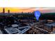 Aerial view of the city showcasing the location of Ponce City Market with sunset colors at 567 Ponce De Leon Ne Ave # 502, Atlanta, GA 30308