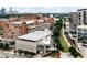 Scenic aerial view of Ponce City Market surrounded by lush greenery and city skyline at 567 Ponce De Leon Ne Ave # 502, Atlanta, GA 30308