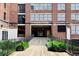 Exterior of building with The Beltline entrance and greenery at 567 Ponce De Leon Ne Ave # 502, Atlanta, GA 30308