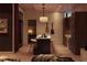 Modern kitchen with a center island, guitars hanging on the wall, and sleek cabinetry at 567 Ponce De Leon Ne Ave # 502, Atlanta, GA 30308