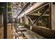 Outdoor seating area with tables and chairs, illuminated by string lights at 567 Ponce De Leon Ne Ave # 502, Atlanta, GA 30308