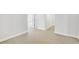 Hallway view with hardwood floors that leads to a doorway at 5711 Tillman Way, Powder Springs, GA 30127