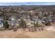 Community homes aerial view, well-maintained lawns and landscaping, close to golf course at 1021 Windermere Xing, Cumming, GA 30041