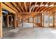 Unfinished basement with exposed framing, offering potential for customization at 1021 Windermere Xing, Cumming, GA 30041