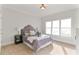 Inviting bedroom with a soft color palette and natural light at 1021 Windermere Xing, Cumming, GA 30041