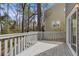 Inviting back deck with wood railings, bathed in natural light at 3188 Kingswood Gln, Decatur, GA 30034