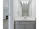 Bathroom vanity features white cabinets, countertop and sink with silver faucet and hardware at 3188 Kingswood Gln, Decatur, GA 30034