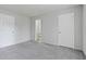 Bedroom featuring wall-to-wall carpeting, light gray paint and multiple doors at 3188 Kingswood Gln, Decatur, GA 30034