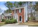 Charming two-story home with brick facade and manicured front yard at 3188 Kingswood Gln, Decatur, GA 30034