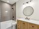 Modern bathroom with a vanity, gray tiled walls, and tub at 478 Majestic Oaks Pl, Smyrna, GA 30082