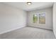 Bedroom featuring gray carpet and a window at 478 Majestic Oaks Pl, Smyrna, GA 30082