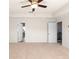 Large, carpeted bedroom with trey ceilings and access to other rooms at 4793 Moonstone Trce, Kennesaw, GA 30144