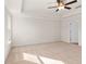 A sunny bedroom featuring a ceiling fan and plenty of natural light at 4793 Moonstone Trce, Kennesaw, GA 30144