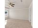 A bright bedroom with a ceiling fan, neutral walls, and plush carpeting at 4793 Moonstone Trce, Kennesaw, GA 30144