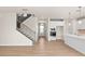 Hallway with staircase, open floorplan, and front door at 4793 Moonstone Trce, Kennesaw, GA 30144