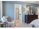 Sitting area in stylish main bedroom leading into the main bathroom featuring a glass enclosed shower at 4793 Moonstone Trce, Kennesaw, GA 30144