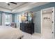 Stylish main bedroom with a calming blue wall, large windows and views into the walk-in closet at 4793 Moonstone Trce, Kennesaw, GA 30144