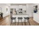 Beautiful kitchen island featuring granite countertops and seating for three at 1346 Magnolia Bend Way # 285, Jonesboro, GA 30238