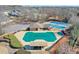 Community amenities include a pool, tennis courts, a playground, and parking at 305 Hembree Grove Trce, Roswell, GA 30076