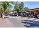 Inviting street view featuring outdoor dining and pedestrian-friendly walkways, highlighting a vibrant community atmosphere at 305 Hembree Grove Trce, Roswell, GA 30076