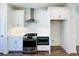 Close up of the modern kitchen features stainless steel appliances, white cabinets, and a tile backsplash at 3187 Moor View Rd # 37, Duluth, GA 30096